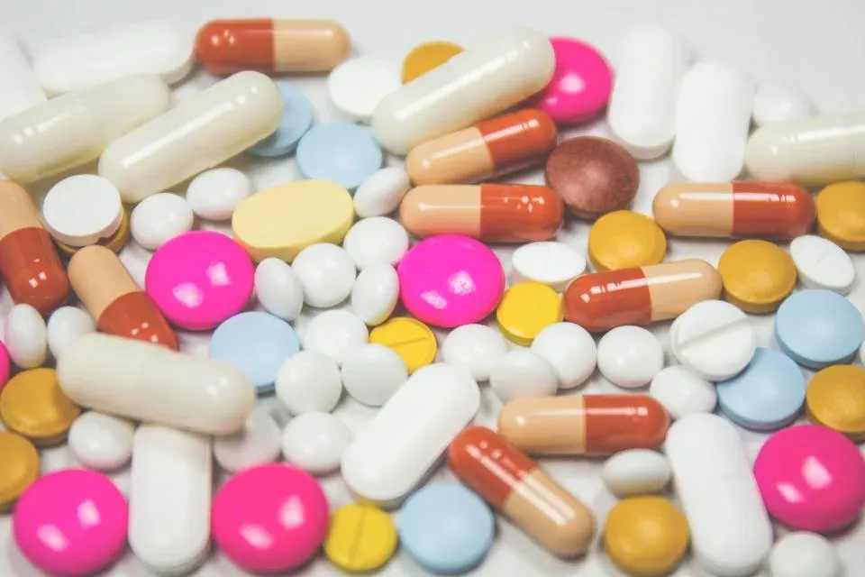 Tablets resting on a plain background